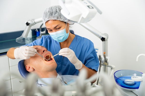 Consult An Implant Specialist To Enhance Your Smile